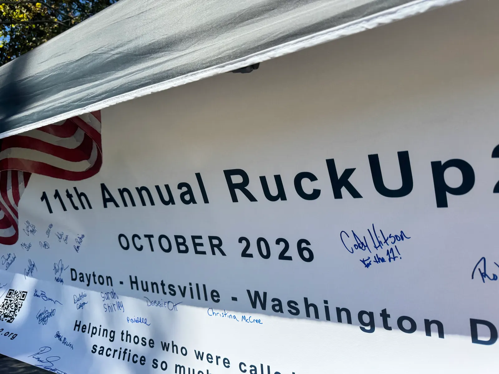 The 11th Annual RuckUp22 October 2026 banner, signed by participants, including "Cody Hitson, For the 22!"